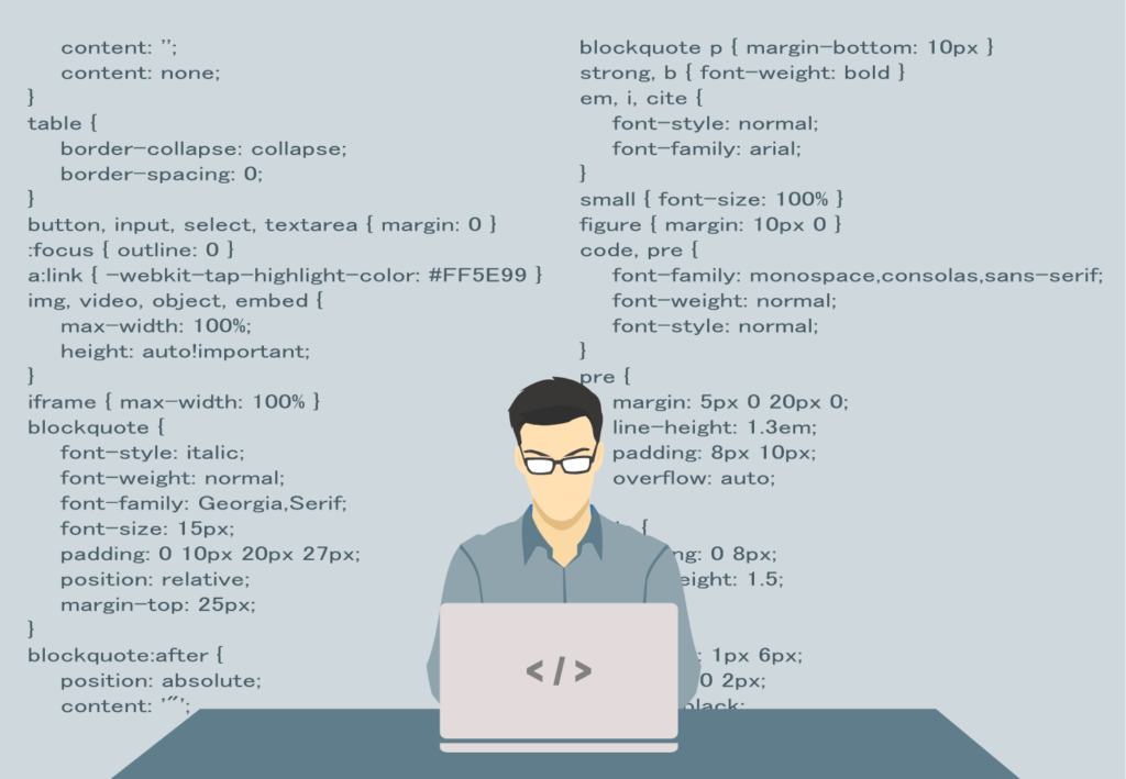 ノートパソコンでプログラミングをしている眼鏡をかけた男性